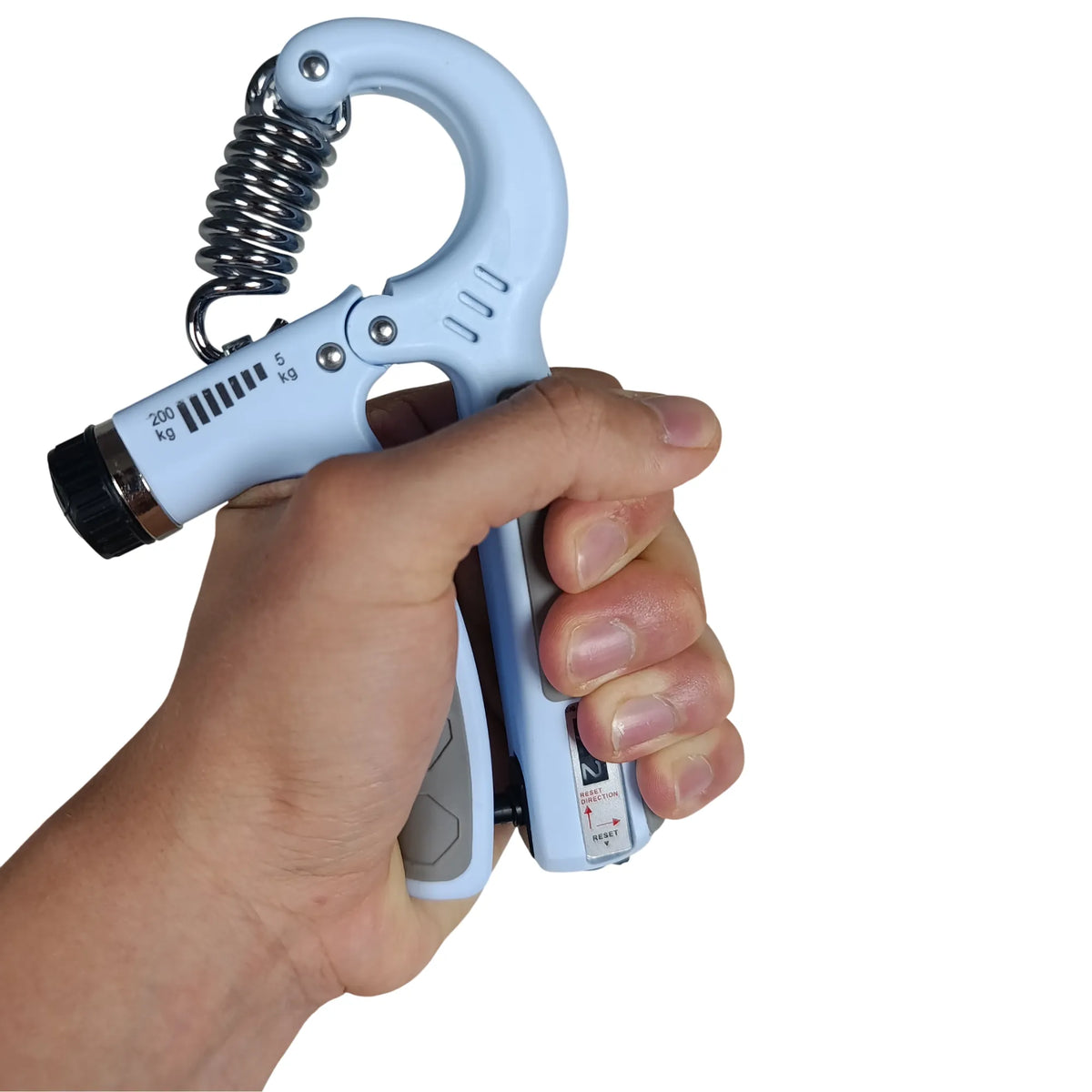 Osoba korzystająca z niebieskiego Ordovit Hand Gripper 5–200 kg
